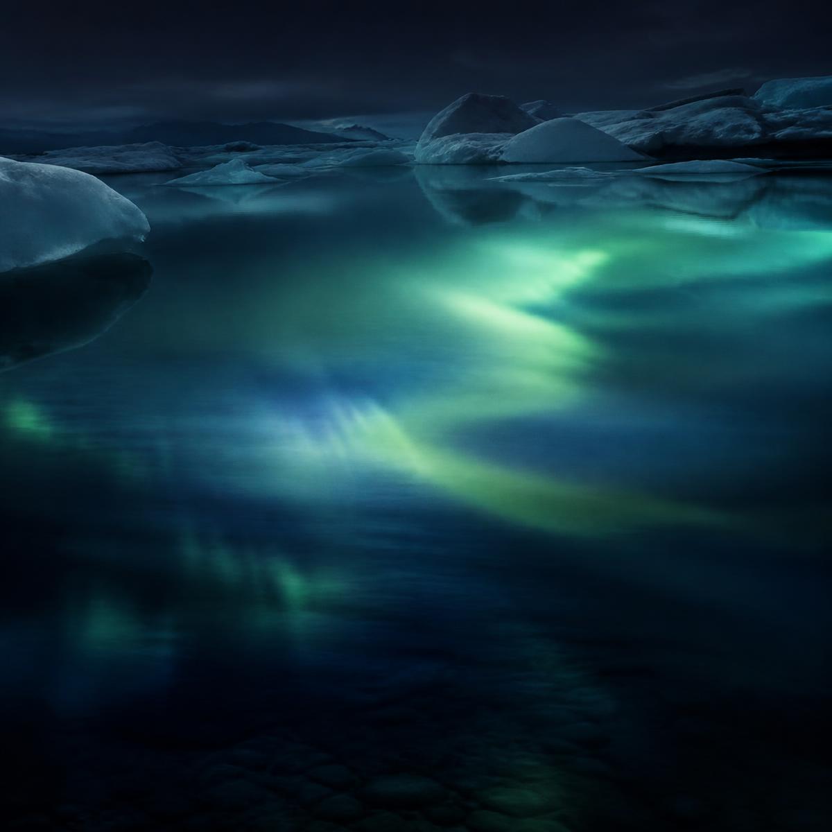 Arctic water reflecting northern light